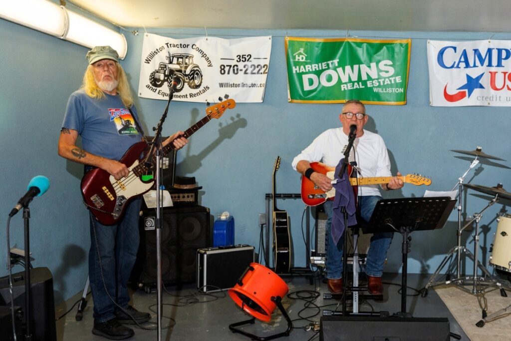 A band performs country music beneath the pavilion during the Central Florida Peanut Festival in Williston. Photo by Walker Smith
