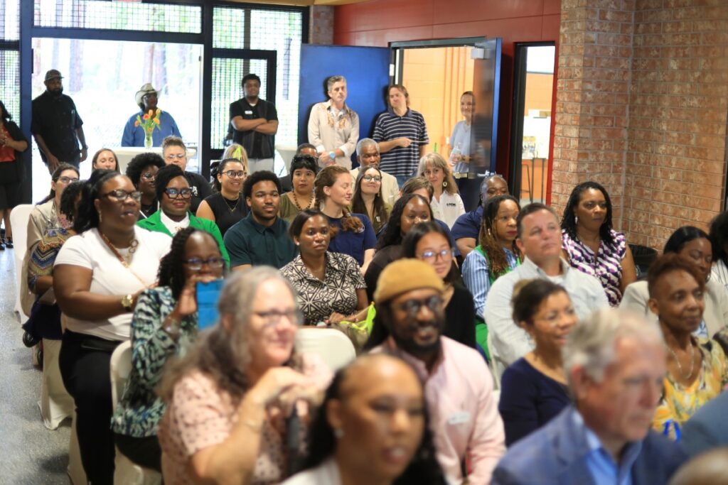 Attendees hear from the Gainesville Housing Authority and Mayor Harvey Ward about the impact of the grant. Photo by Seth Johnson
