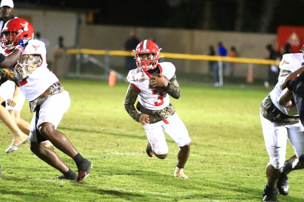 Bradford's Drew Simmons (3) with a second-quarter run against Eastside at Citizens Field on Friday. Photo by C.J. Gish