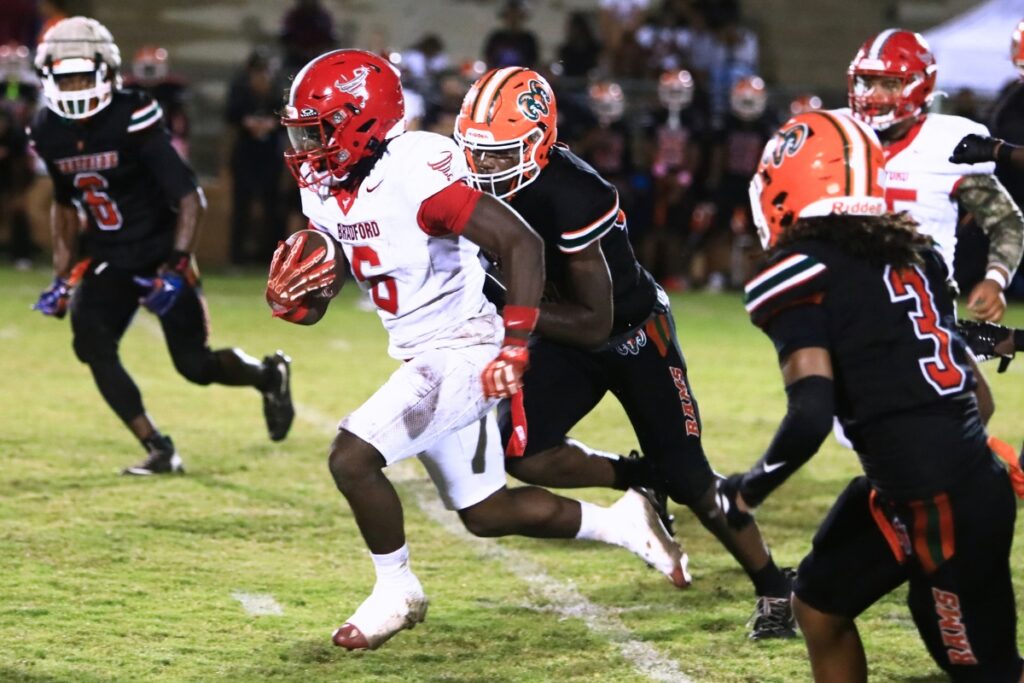 Bradford's Iyen Addison (6) breaks through the Eastside defense for a second-quarter touchdown on Friday. Photo by C.J. Gish 1 (1)