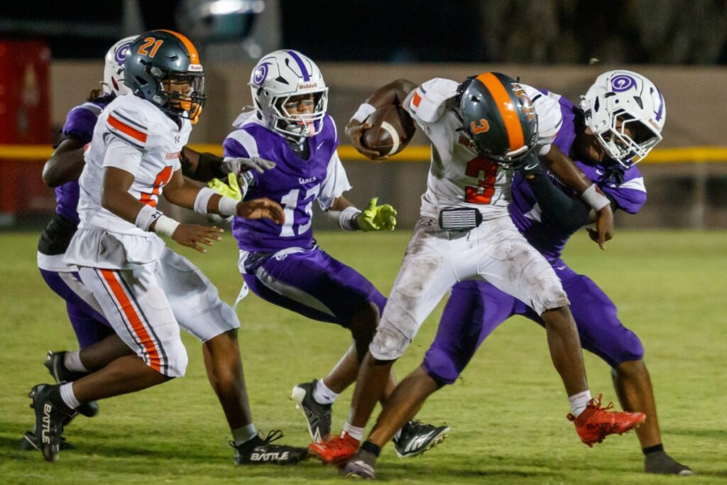 Gainesville defenders stop Mount Dora from advancing downfield at Citizens Field on Friday. Photo by Walker Smith