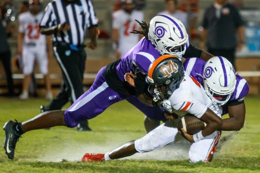 Gainesville defenders stop Mount Dora from advancing downfield at Citizens Field on Friday. Photo by Walker Smtih