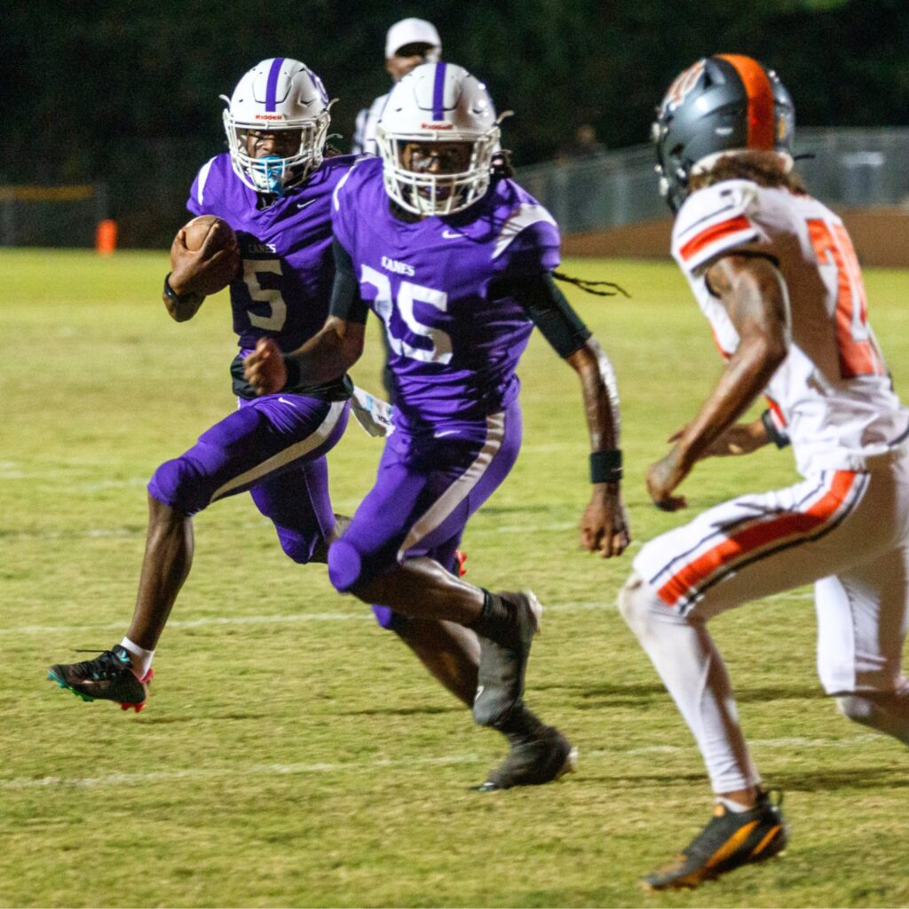 Gainesville's Joshua McClellan advances downfield against Mount Dora at Citizens Field on Friday night. Photo by Walker Smith