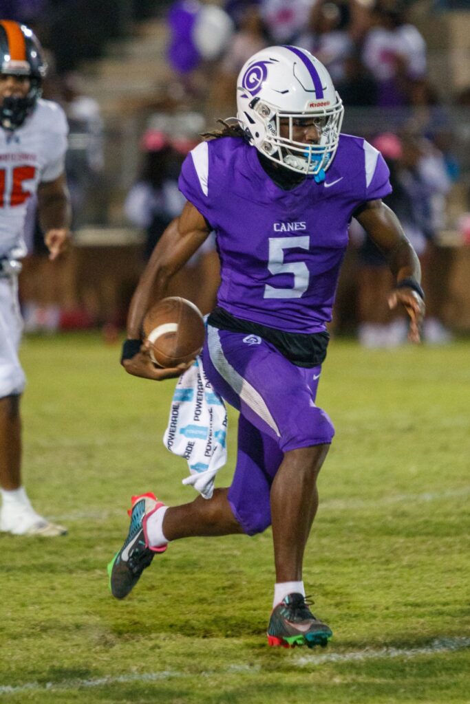 Gainesville's Joshua McClellan with a run downfield against Mount Dora at Citizens Field on Friday. Photo by Walker Smith