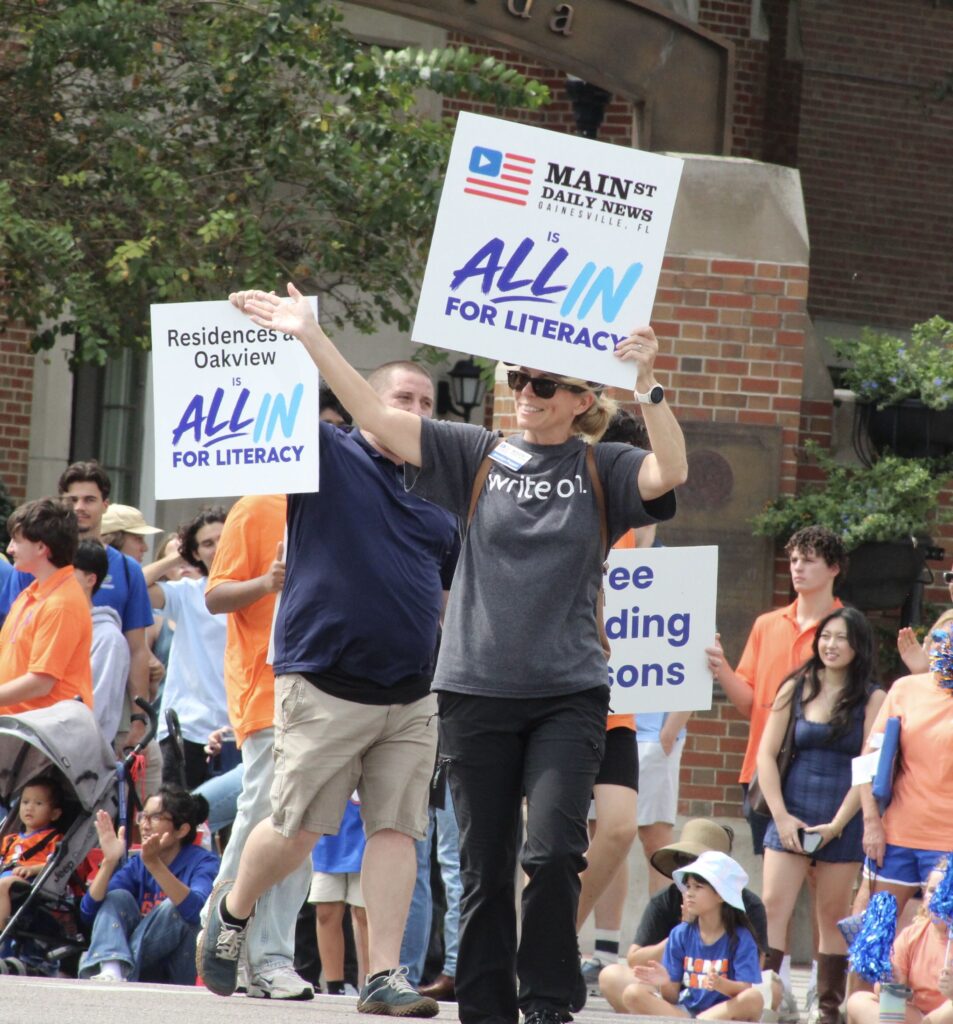 Mainstreet Community Partnership Manager Janalyn Peppel in the UF Homecoming Parade. (Photo by Nick Anschultz)