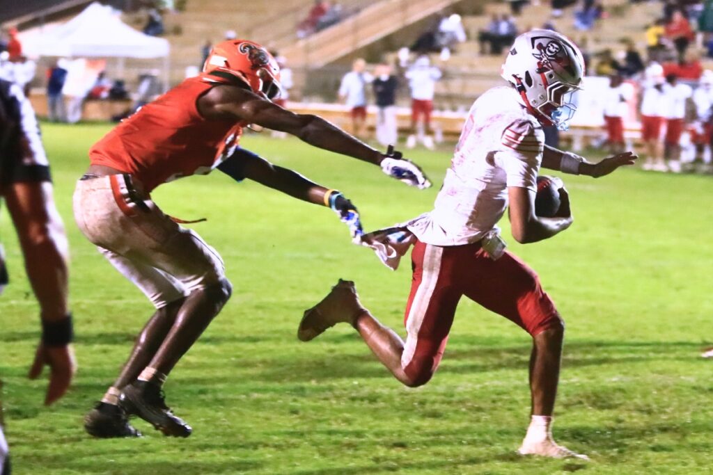 Santa Fe's Gavin Peterson (2) runs for a third-quarter touchdown against Eastside on Thursday. Photo by C.J. Gish