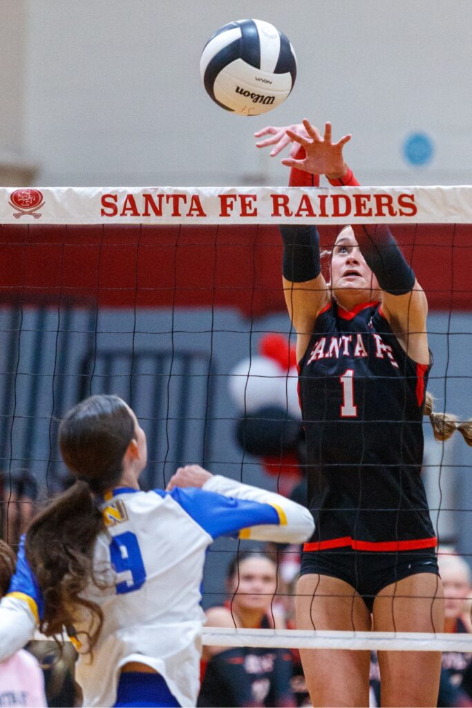 Santa Fe's Lalyn Sikes defends her side of the court during the Class 3A-District 5 championship match against Newberry on Thursday. Photo by Walker Smith