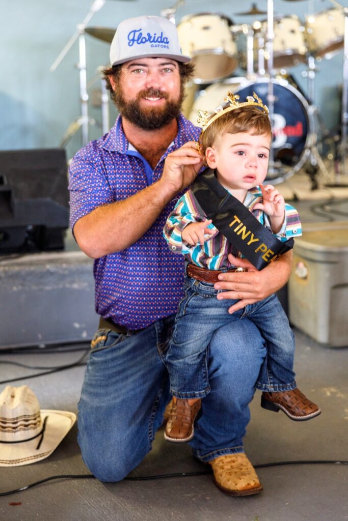 The Peanut King poses for a portrait after winning the crown Saturday at the annual Central Florida Peanut Festival in Williston. Photo by Walker Smith