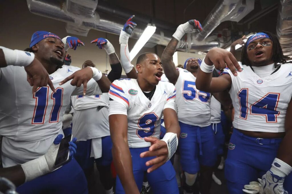 Quarterback Tramell Jones Jr. and teammates celebrate after Saturday's upset win at No. 7-ranked Texas.